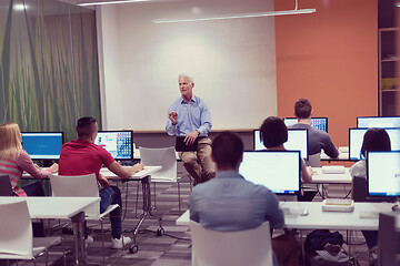 Image showing teacher and students in computer lab classroom