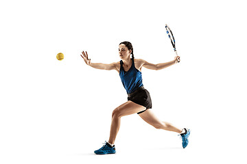 Image showing Full length portrait of young woman playing tennis isolated on white background