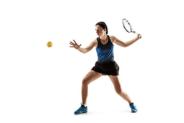 Image showing Full length portrait of young woman playing tennis isolated on white background