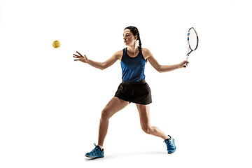 Image showing Full length portrait of young woman playing tennis isolated on white background