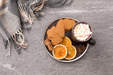 Image showing hot chocolate with dried orange, cookies and anise