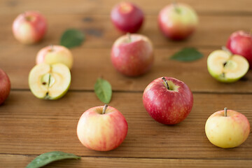 Image showing ripe red apples on wooden table