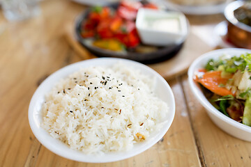 Image showing close up of boiled rice in bowl on table