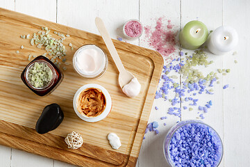 Image showing Beautiful spa composition on massage table in wellness center, copyspace