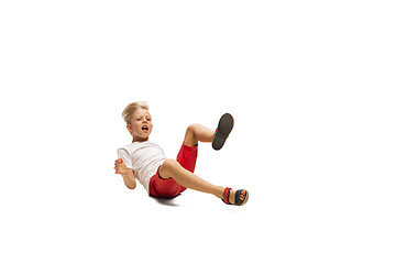 Image showing Happy little caucasian boy jumping and running isolated on white background