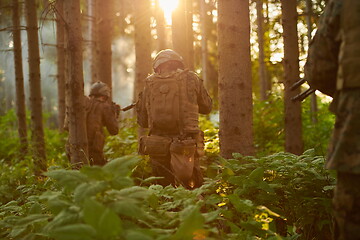 Image showing Modern warfare Soldiers  Squad  in battle