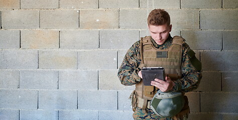 Image showing soldier using tablet computer