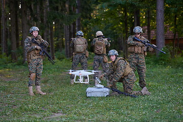 Image showing Soldiers Squad are Using Drone for Scouting