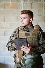 Image showing soldier using tablet computer