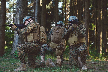 Image showing Soldier fighters standing together