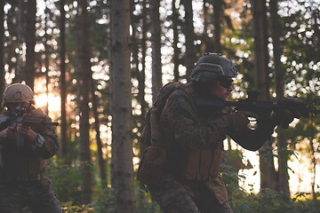 Image showing Modern warfare Soldiers  Squad  in battle