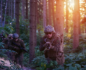 Image showing Modern warfare Soldiers  Squad  in battle