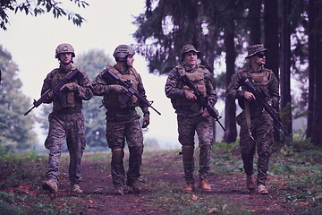 Image showing soldiers squad relaxed walking