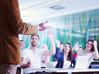 Image showing close up of teacher hand while teaching in classroom