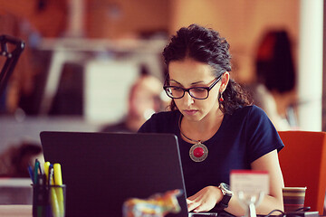 Image showing startup business, woman  working on laptop