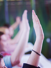 Image showing students group raise hands up on class