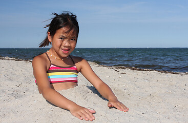 Image showing Cute girl at the beach in the summer