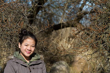 Image showing Portrait of a young cute girl looking at the camera