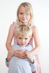 Image showing Portrait of a brother and sister in studio