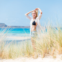 Image showing Free Happy Woman Enjoying Sun on Vacations.