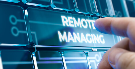 Image showing Remote Managing - Man Pushing Button on Futuristic Interface.