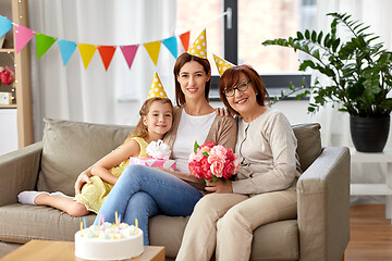 Image showing mother, daughter and grandmother at birthday party