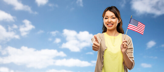 Image showing happy asian woman with american flag