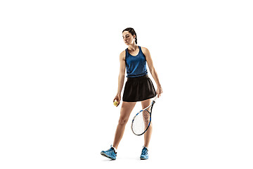 Image showing Full length portrait of young woman playing tennis isolated on white background