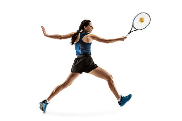 Image showing Full length portrait of young woman playing tennis isolated on white background