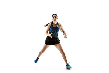 Image showing Full length portrait of young woman playing tennis isolated on white background