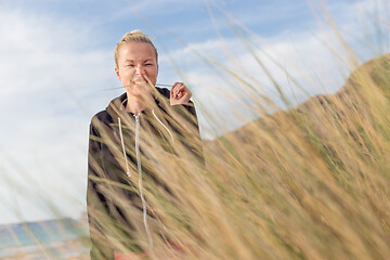 Image showing Relaxed Happy Woman Enjoying Walk on Beach