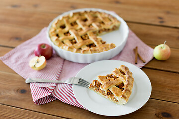 Image showing close up of apple pie and fork on plate