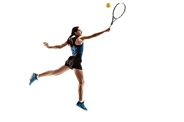 Image showing Full length portrait of young woman playing tennis isolated on white background