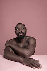 Image showing Close up portrait of a young naked african man indoors