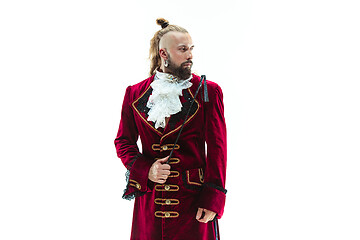 Image showing The young man wearing a traditional medieval costume of marquis