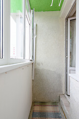 Image showing Old balcony in the apartment, glazed with plastic windows