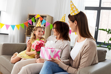 Image showing granddaughter greeting grandmother on birthday