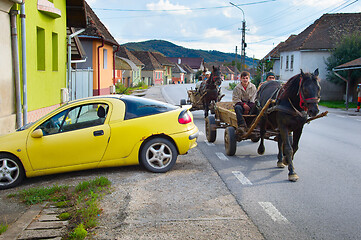 Image showing People driving horse cart. Romania