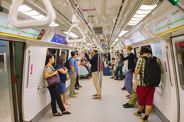 Image showing People inside subway train. Singapore