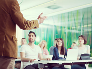 Image showing close up of teacher hand while teaching in classroom