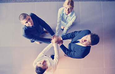 Image showing business people group joining hands