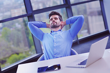 Image showing happy young business man at office