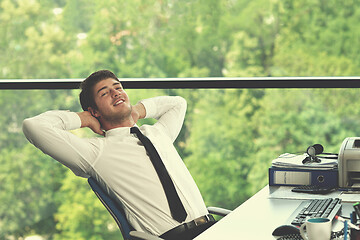 Image showing happy young business man at office