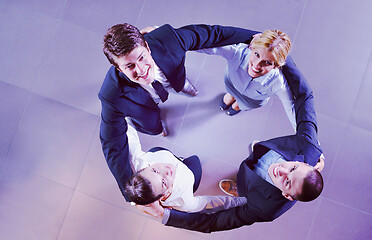 Image showing business people group joining hands