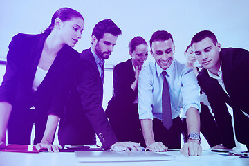 Image showing business people in a meeting at office