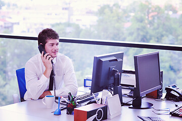 Image showing happy young business man at office