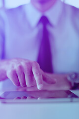 Image showing business man using tablet compuer at office