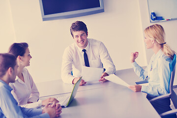 Image showing business people in a meeting at office