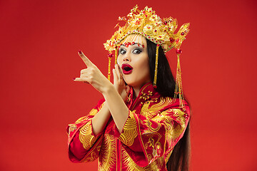 Image showing Chinese traditional woman. Beautiful young girl wearing in national costume