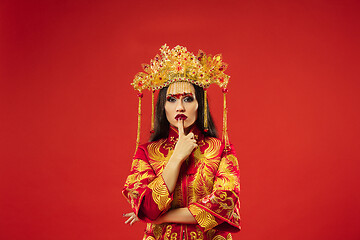 Image showing Chinese traditional woman. Beautiful young girl wearing in national costume